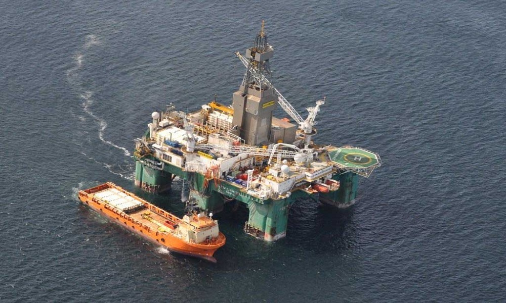 Leiv Eiriksson oil rig with supply vessel, offshore Falklands, 2012 exploration campaign